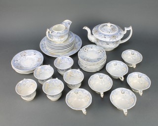 A 19th Century Rockingham tea set comprising teapot, 6 small tea cups, 6 large tea cups, 10 saucers, 11 large saucers, milk jug and sandwich plate 