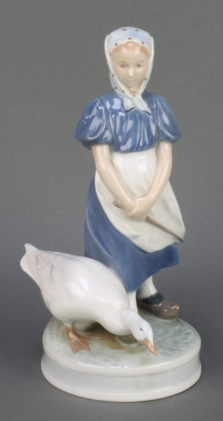 A Royal Copenhagen figure of a girl and goose no.527 9" 