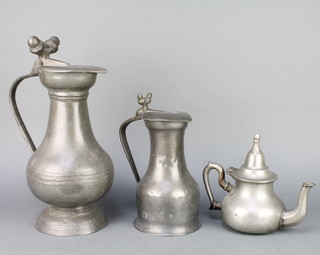 A French 18th/19th Century pewter baluster shaped lidded jug with acorn thumb piece 12", a smaller ditto 8" and an Indian pewter coffee pot 