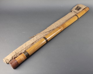 A Hardy Edwardian bamboo rod tube complete with leather cap and canvas case 