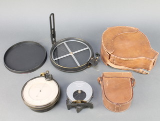 A surveying aneroid barometer with silvered dial 4 1/2", a Verschoyle Transit together with a Stanley surveying compass, the last 2 items are  in leather cases 