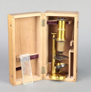 A 19th Century student's single pillar microscope 6 1/2", 3 plain glass slides boxed 