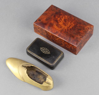 A 19th Century black lacquered snuff box with hinged lid, a figured walnut trinket box 2" x 6" x 3 1/2" and a brass ashtray in the form of a gentleman's shoe 6" 