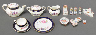 A Coalport 6 piece miniature tea set decorated with roses and minor miniature items 