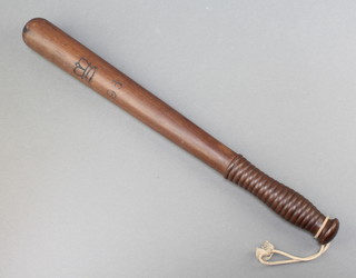A Victorian turned wooden police truncheon by Parker with crown and no. 96 17 1/2" 