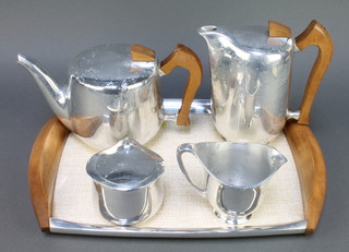 A 5 piece Picquot ware tea service comprising twin handled tray, teapot, cream jug, hot water jug and sucrier 