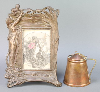 William Arthur Smith Benson, an Art Nouveau waisted copper jug with brass handle 10", an Art Nouveau style metal easel photograph frame decorated a standing lady 11" x 7" 