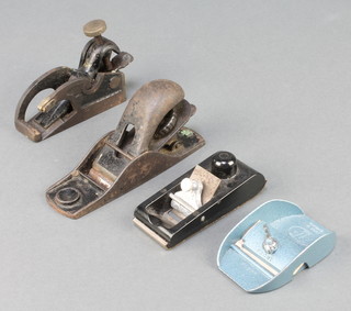A steel thumb plane marked 103 (some rust),  a Preston & Sons steel thumb plane (damaged), a Zip patent plane and 1 other 