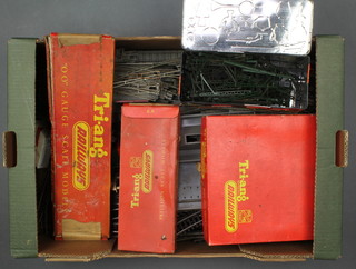A quantity of Triang rails, buildings, etc contained in 2 shallow boxes