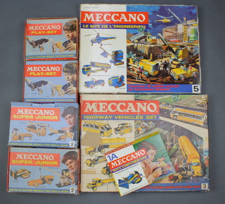Two Meccano Super Junior kits,  a Meccano 1A set, 2 Meccano play sets, 2 Meccano no.3 highway vehicle sets, a French Meccano set no.5 