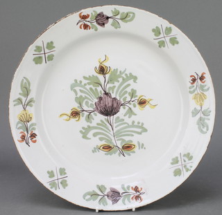 An 18th Century Delft ware polychrome shallow bowl decorated with a stylised flower the border similarly decorated 13" 