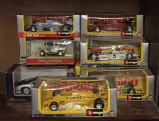 Ten Burago model racing cars, a Hallmark model racing car, a Maisto model car and 2 Matchbox Models of Yesteryear 
