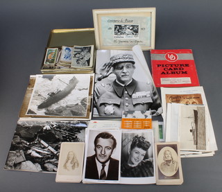 A collection of various cigarette cards, postcards of stars, liners and other photographs 
