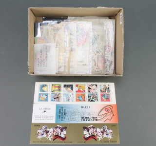 A box of French stamps, stamped envelopes etc 