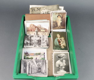 A quantity of 1930's black and white and coloured postcards