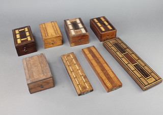 Four folding crib boards incorporating boxes together with 3 inlaid crib boards 