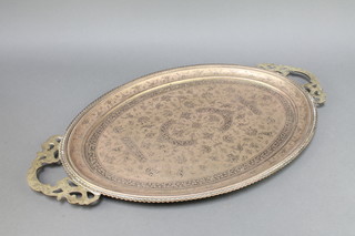 A Benares brass twin handled tea tray 27" x 15" with later applied handles