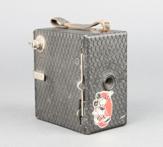 An Ensign Mickey Mouse box camera in black case with Mickey sticker to the front 