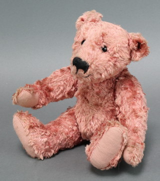 A pink mohair teddybear with articulated limbs 12" 