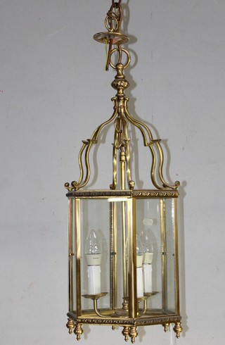 A Georgian style hexagonal gilt metal 3 light hall lantern 22 1/2"h x 9"