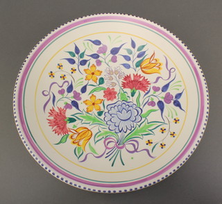 A Poole Pottery dish decorated with flowers 13" 