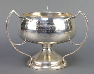 A stylish Arts & Crafts style silver bowl with 3 handles on a splayed foot Birmingham 1914, 406 grams