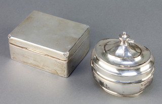 A Victorian silver tea caddy of elliptical form London 1898, 195 grams together with a rectangular silver cigarette box