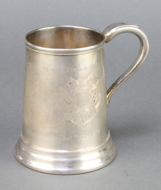 An 800 standard tapered mug with beaded decoration 183 grams 