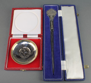 A silver paper knife commemorating the 1977 Silver Jubilee Birmingham 1977 134 grams together with a silver Armada dish London 1977, 66 grams 