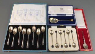 A cased set of 8 silver teaspoons, mixed dates, a cased set of 6 silver bean end coffee spoons, 2 presentation spoons all cased, 206 grams 