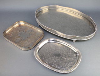 An oval silver plated galleried 2 handled tray 20", 2 plated stands 