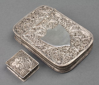 A Continental silver filigree card case with vacant cartouche a ditto patch box 86 grams 