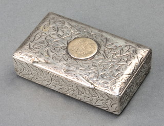 A Victorian silver snuff box with chased leaf decoration and cartouche Birmingham 1884 34 grams 