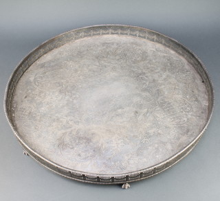 A circular silver plated galleried tray 22 1/2" 