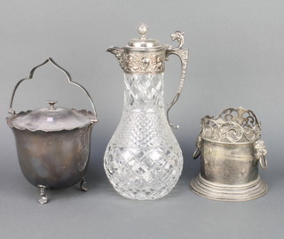 An Edwardian silver plated mounted ewer with finial, do. ice bucket and siphon stand