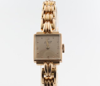 A lady's 18ct yellow gold Tissot wrist watch with ditto bracelet approx 35 grams