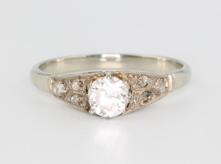 A white gold single stone diamond ring size L