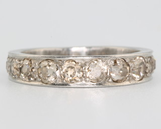 A platinum and diamond half eternity ring size M 1/2