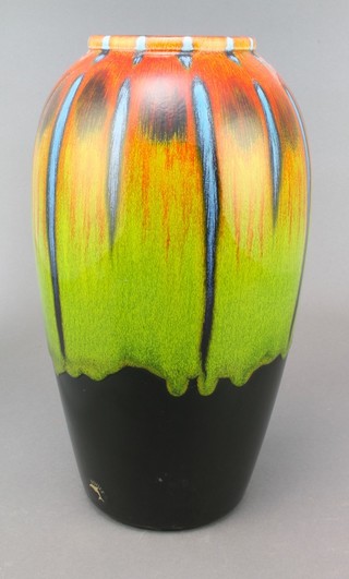 A Poole Pottery oviform vase with polychrome slip glaze decoration 13" 