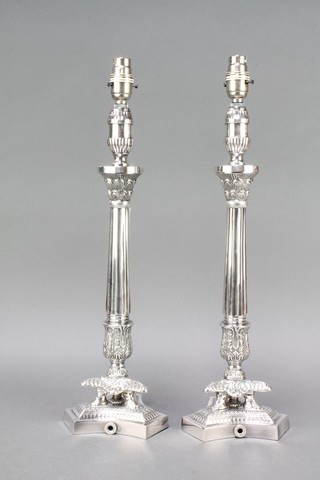 A pair of  plated Empire style table lamps on trefoil bases 17" 