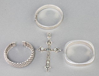 A silver moonstone cross set pendant, 3 silver bracelets 31.7 grams