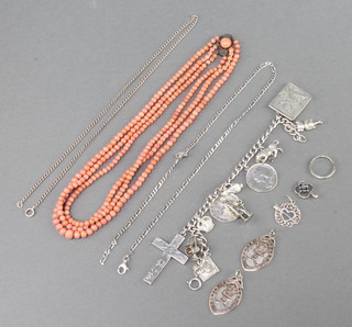 A Victorian coral bead necklace with silver clasp, a silver charm bracelet and a quantity of silver jewellery 