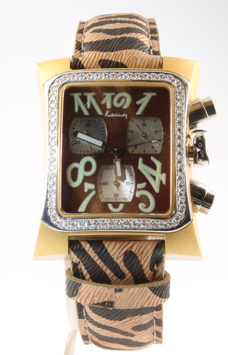 A lady's Kutchinsky diamond set transatlantic, chronograph wristwatch with animal print leather strap 