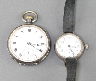 A silver cased Omega mechanical pocket watch with seconds at 6 o'clock and a silver cased Waltham wristwatch with seconds at 6 o'clock 