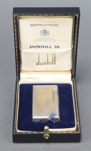 A gentleman's silver plated Dunhill 70 cigarette lighter cased