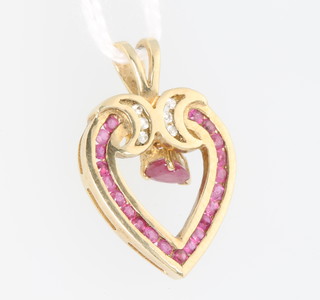 A 9ct yellow gold ruby and diamond heart pendant 2 grams