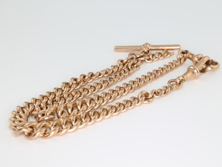 A 9ct yellow gold Albert and chain with T bar and clasps 49.6 grams 