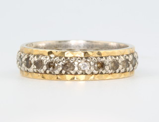 An 18ct yellow gold and silver gem set band size Q 