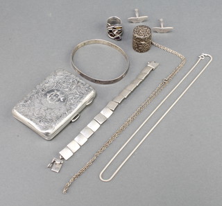 A silver bangle and necklace, a silver cigarette case 187 grams