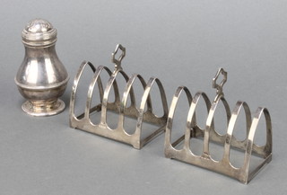 A silver pepperette London 1964 and 2 silver 5 bar toast racks 181 grams 
